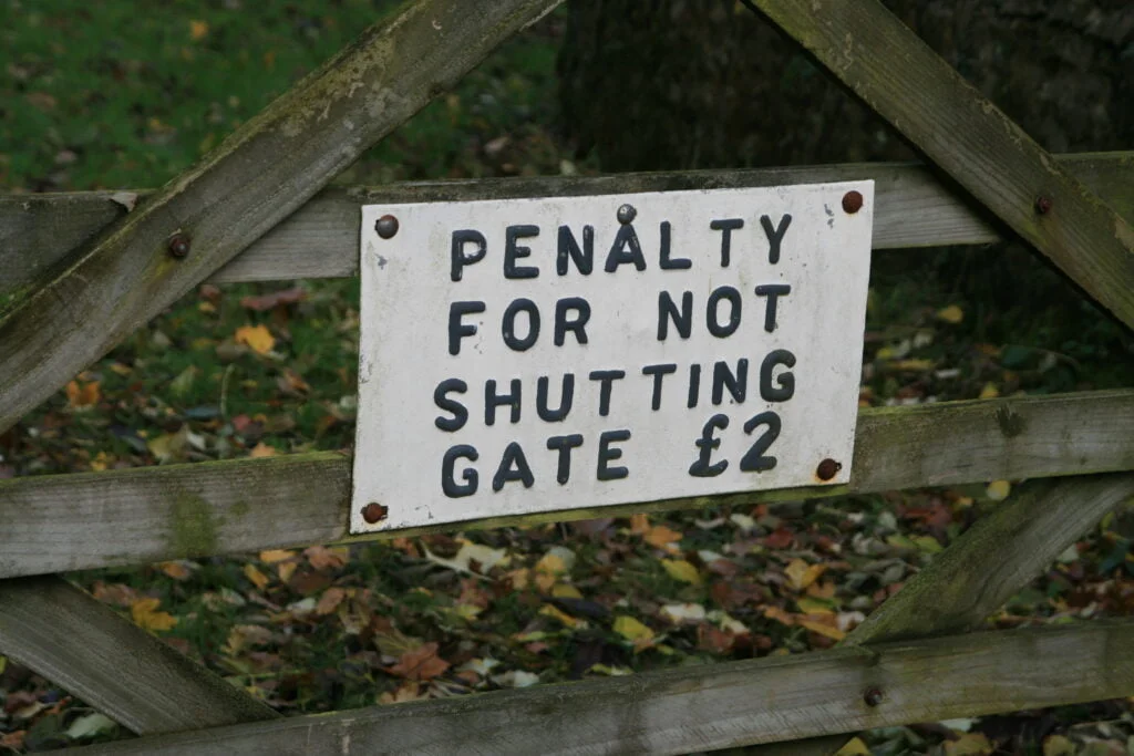 Wooden farm gate with penalty sign for not shutting the gate ($2)